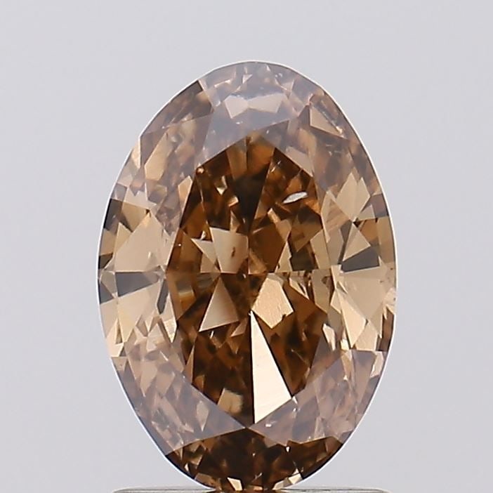 Loose Diamond - OVAL 1.1ct Fancy Brown SI1: Loose Diamond - OVAL 1.1ct Fancy Brown SI1 Source: This is a real non-mined Diamond that has been grown in a lab Shape: OVAL Carats: 1.1 Color: Fancy Brown Certification: IGI Video: