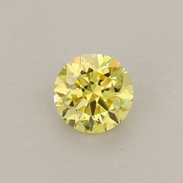 Loose Diamond - ROUND 0.31ct Fancy Intense Yellow VS1: Loose Diamond - ROUND 0.31ct Fancy Intense Yellow VS1 Source: This is a real non-mined Diamond that has been grown in a lab Shape: ROUND Carats: 0.31 Color: Fancy Intense Yellow Certification: IGI Vid
