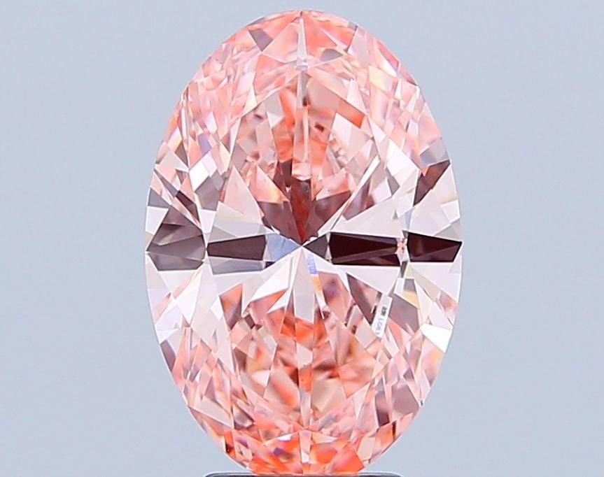 Loose Diamond - OVAL 4.07ct Fancy Vivid Pink VVS2: Loose Diamond - OVAL 4.07ct Fancy Vivid Pink VVS2 Source: This is a real non-mined Diamond that has been grown in a lab Shape: OVAL Carats: 4.07 Color: Fancy Vivid Pink Certification: IGI Video:
