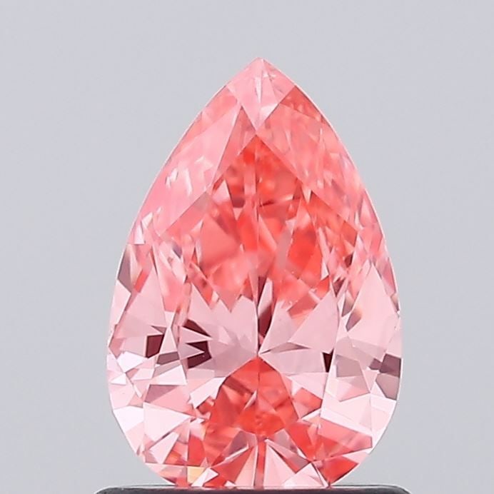 Loose Diamond - PEAR 0.74ct Fancy Vivid Pink VVS2: Loose Diamond - PEAR 0.74ct Fancy Vivid Pink VVS2 Source: This is a real non-mined Diamond that has been grown in a lab Shape: PEAR Carats: 0.74 Color: Fancy Vivid Pink Certification: IGI Video: