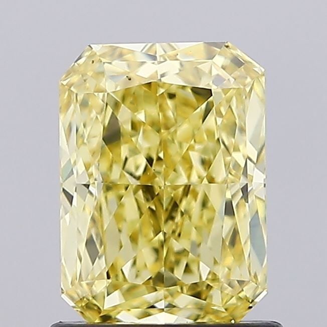 Loose Diamond - RADIANT 1.24ct Fancy Vivid Yellow VS1: Loose Diamond - RADIANT 1.24ct Fancy Vivid Yellow VS1 Source: This is a real non-mined Diamond that has been grown in a lab Shape: RADIANT Carats: 1.24 Color: Fancy Vivid Yellow Certification: IGI Vid
