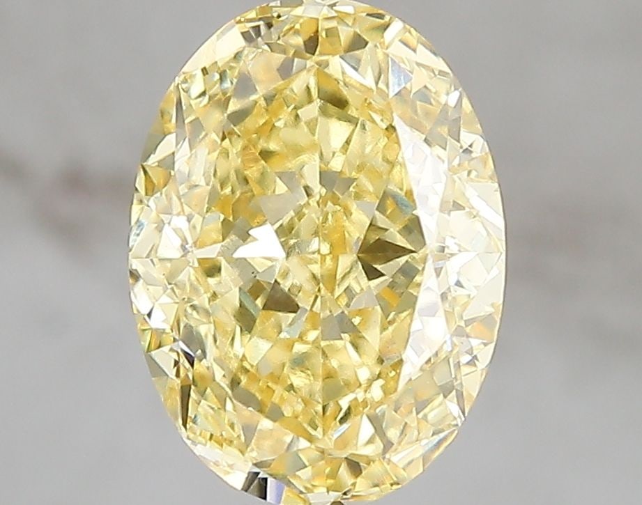 Loose Diamond - OVAL 3.03ct Fancy Vivid Yellow VS1: Loose Diamond - OVAL 3.03ct Fancy Vivid Yellow VS1 Source: This is a real non-mined Diamond that has been grown in a lab Shape: OVAL Carats: 3.03 Color: Fancy Vivid Yellow Certification: IGI Video: