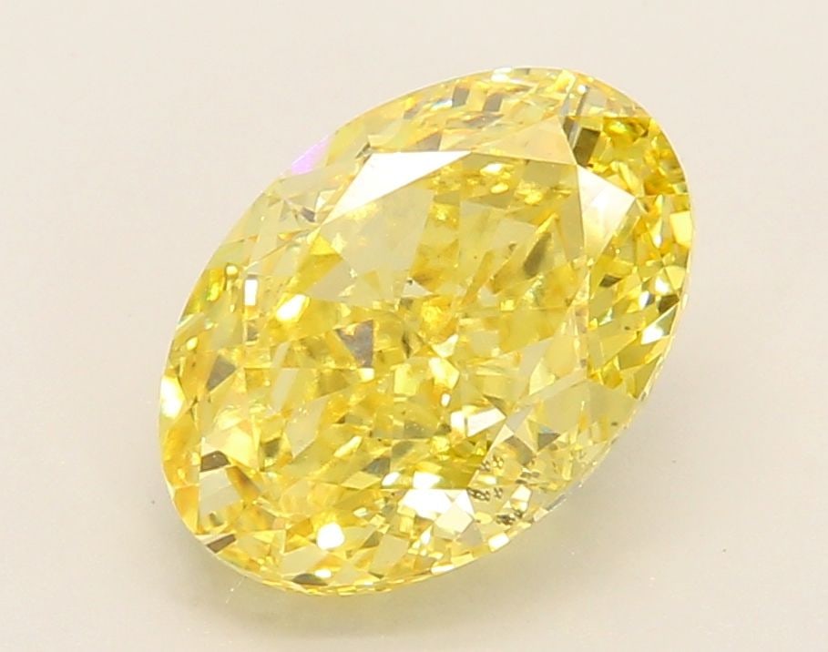 Loose Diamond - OVAL 3.27ct Fancy Vivid Yellow VS2: Loose Diamond - OVAL 3.27ct Fancy Vivid Yellow VS2 Source: This is a real non-mined Diamond that has been grown in a lab Shape: OVAL Carats: 3.27 Color: Fancy Vivid Yellow Certification: IGI Video: