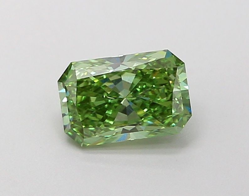 Loose Diamond - RADIANT 0.71ct Fancy Vivid Green VS1: Loose Diamond - RADIANT 0.71ct Fancy Vivid Green VS1 Source: This is a real non-mined Diamond that has been grown in a lab Shape: RADIANT Carats: 0.71 Color: Fancy Vivid Green Certification: IGI Video