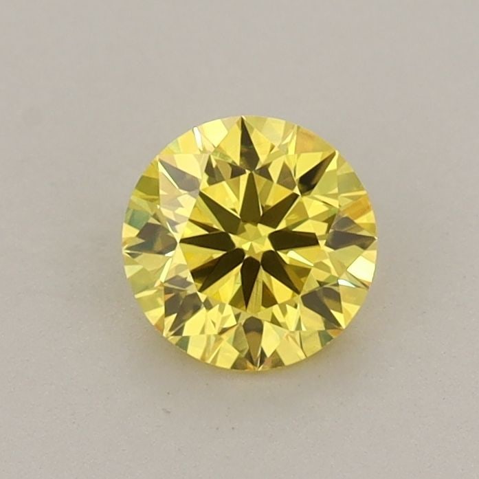 Loose Diamond - ROUND 0.54ct Fancy Vivid Yellow VVS2: Loose Diamond - ROUND 0.54ct Fancy Vivid Yellow VVS2 Source: This is a real non-mined Diamond that has been grown in a lab Shape: ROUND Carats: 0.54 Color: Fancy Vivid Yellow Certification: IGI Video: