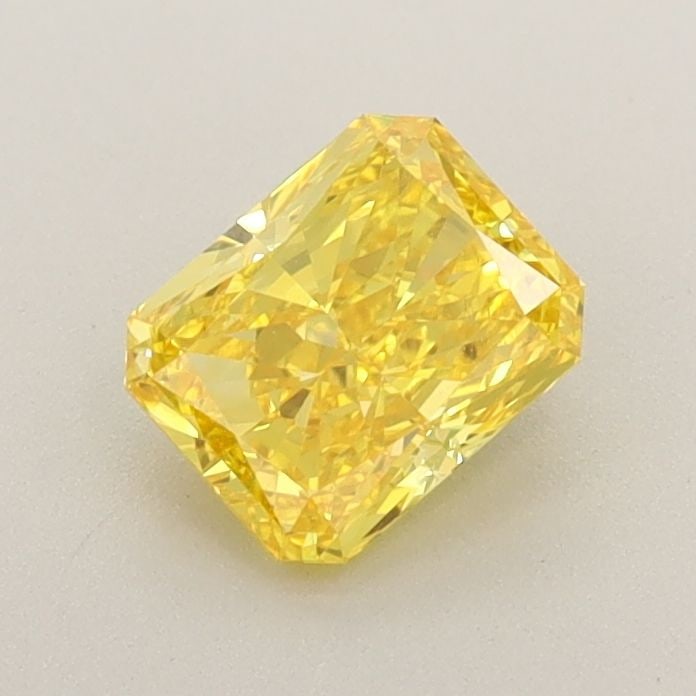 Loose Diamond - RADIANT 0.73ct Fancy Vivid Yellow VVS1: Loose Diamond - RADIANT 0.73ct Fancy Vivid Yellow VVS1 Source: This is a real non-mined Diamond that has been grown in a lab Shape: RADIANT Carats: 0.73 Color: Fancy Vivid Yellow Certification: IGI Vi