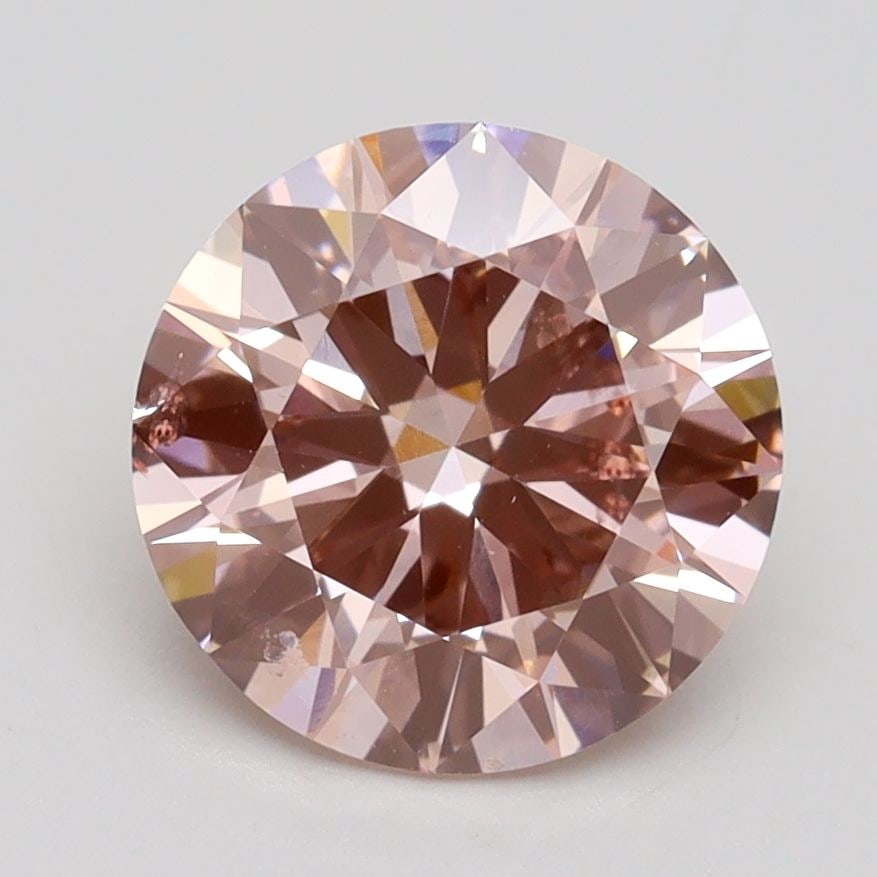 Loose Diamond - ROUND 2.3ct Fancy Intense Pink SI1: Loose Diamond - ROUND 2.3ct Fancy Intense Pink SI1 Source: This is a real non-mined Diamond that has been grown in a lab Shape: ROUND Carats: 2.3 Color: Fancy Intense Pink Certification: IGI Video: