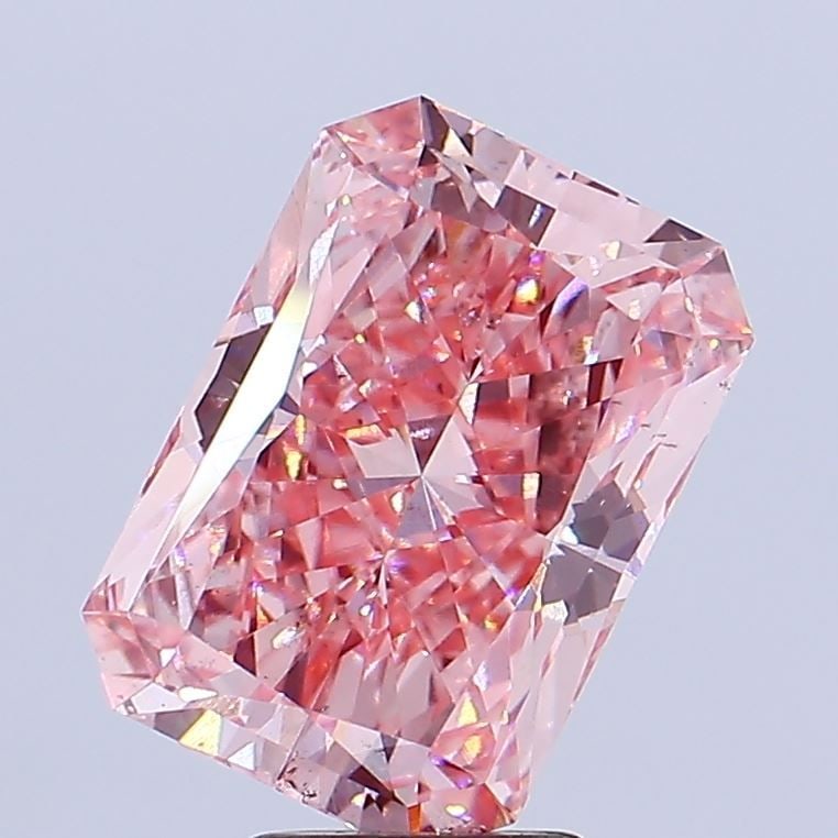 Loose Diamond - RADIANT 5.02ct Fancy Vivid Pink SI1: Loose Diamond - RADIANT 5.02ct Fancy Vivid Pink SI1 Source: This is a real non-mined Diamond that has been grown in a lab Shape: RADIANT Carats: 5.02 Color: Fancy Vivid Pink Certification: IGI Video: