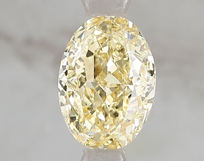 Loose Diamond - OVAL 1.54ct Fancy Intense Yellow VS1: Loose Diamond - OVAL 1.54ct Fancy Intense Yellow VS1 Source: This is a real non-mined Diamond that has been grown in a lab Shape: OVAL Carats: 1.54 Color: Fancy Intense Yellow Certification: IGI Video