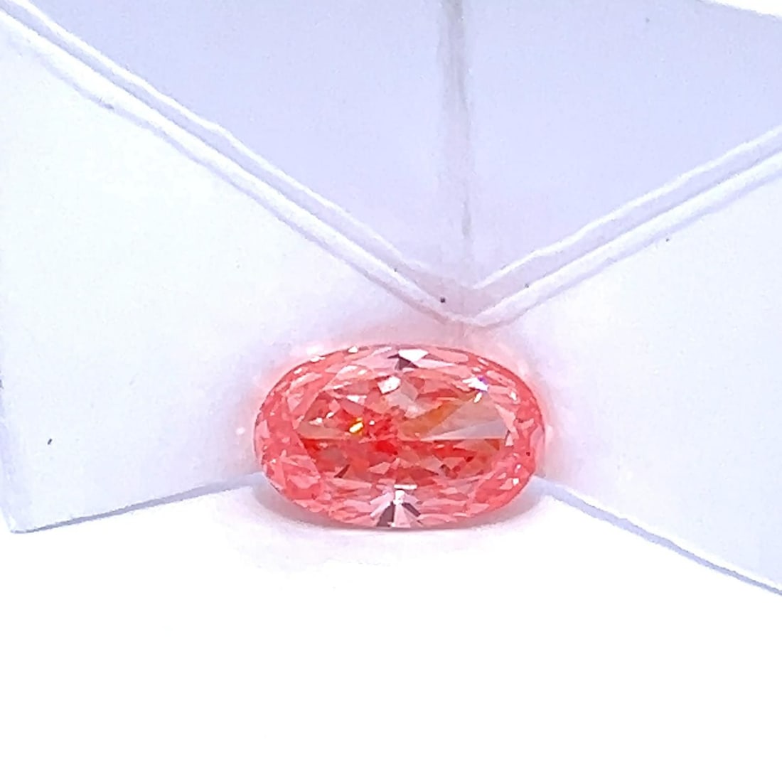 Loose Diamond - OVAL 3.57ct Fancy Vivid Pink VVS2: Loose Diamond - OVAL 3.57ct Fancy Vivid Pink VVS2 Source: This is a real non-mined Diamond that has been grown in a lab Shape: OVAL Carats: 3.57 Color: Fancy Vivid Pink Certification: IGI Video: