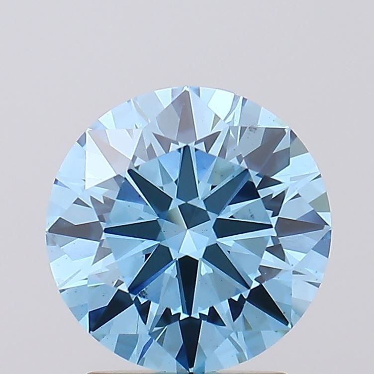 Loose Diamond - ROUND 2.01ct Fancy Vivid Blue VS1: Loose Diamond - ROUND 2.01ct Fancy Vivid Blue VS1 Source: This is a real non-mined Diamond that has been grown in a lab Shape: ROUND Carats: 2.01 Color: Fancy Vivid Blue Certification: IGI Video: