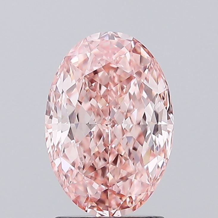 Loose Diamond - OVAL 2.12ct Fancy Vivid Pink VS1: Loose Diamond - OVAL 2.12ct Fancy Vivid Pink VS1 Source: This is a real non-mined Diamond that has been grown in a lab Shape: OVAL Carats: 2.12 Color: Fancy Vivid Pink Certification: IGI Video: