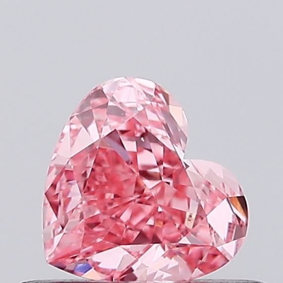 Loose Diamond - HEART 0.44ct Fancy Vivid Pink VVS2: Loose Diamond - HEART 0.44ct Fancy Vivid Pink VVS2 Source: This is a real non-mined Diamond that has been grown in a lab Shape: HEART Carats: 0.44 Color: Fancy Vivid Pink Certification: IGI Video: