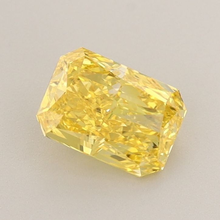 Loose Diamond - RADIANT 0.85ct Fancy Vivid Yellow VS2: Loose Diamond - RADIANT 0.85ct Fancy Vivid Yellow VS2 Source: This is a real non-mined Diamond that has been grown in a lab Shape: RADIANT Carats: 0.85 Color: Fancy Vivid Yellow Certification: IGI Vid