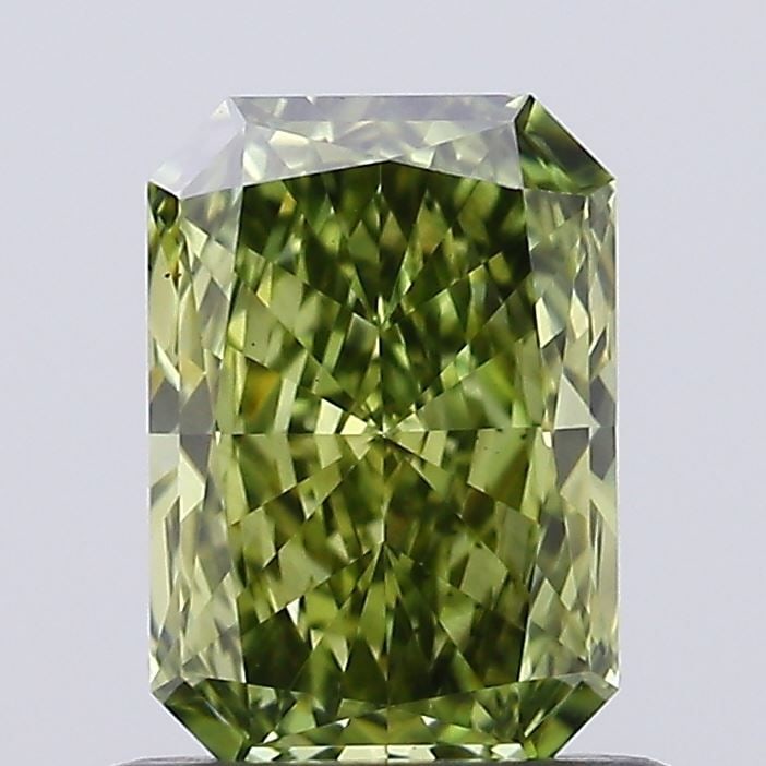 Loose Diamond - RADIANT 0.71ct Fancy Vivid Green VS1: Loose Diamond - RADIANT 0.71ct Fancy Vivid Green VS1 Source: This is a real non-mined Diamond that has been grown in a lab Shape: RADIANT Carats: 0.71 Color: Fancy Vivid Green Certification: NONE Vide