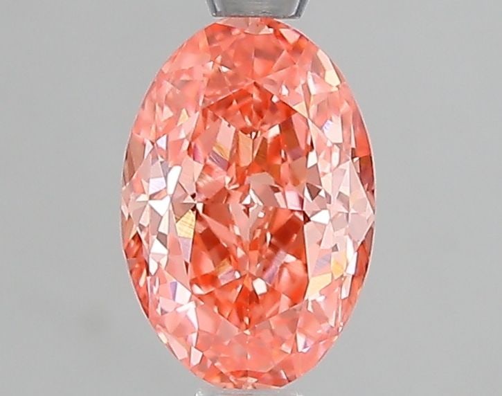 Loose Diamond - OVAL 1.08ct Fancy Vivid Pink VS1: Loose Diamond - OVAL 1.08ct Fancy Vivid Pink VS1 Source: This is a real non-mined Diamond that has been grown in a lab Shape: OVAL Carats: 1.08 Color: Fancy Vivid Pink Certification: IGI Video: