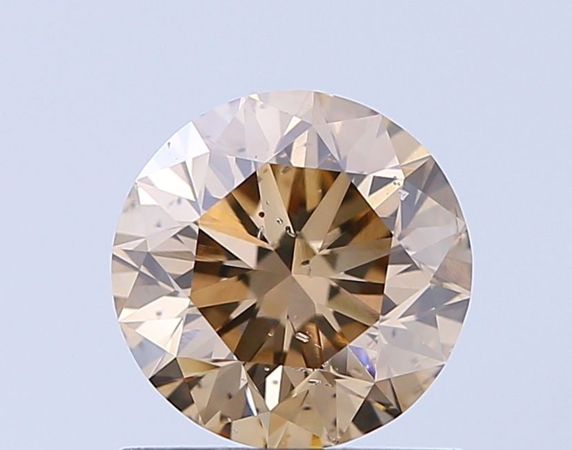 Loose Diamond - ROUND 1.02ct Fancy Brown SI1: Loose Diamond - ROUND 1.02ct Fancy Brown SI1 Source: Natural Shape: ROUND Carats: 1.02 Color: Fancy Brown Certification: NONE Video: