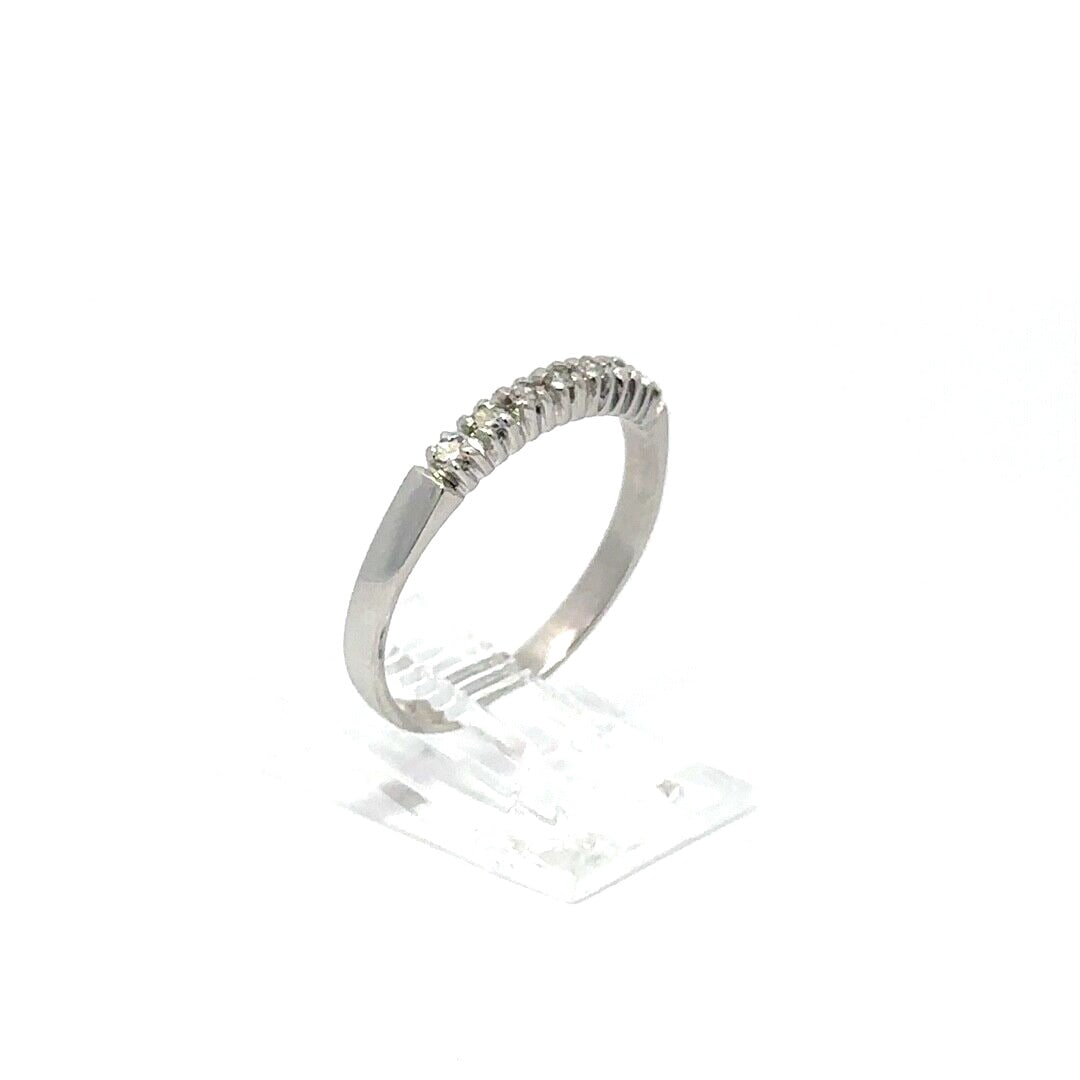 14K White Gold Diamond Stackable Band Ring Size 7: 14K White Gold Diamond Stackable Band Ring Size 7 This vintage stackable wedding band is crafted from solid 14K white gold and features seven natural, single cut diamonds with a combined weight of app