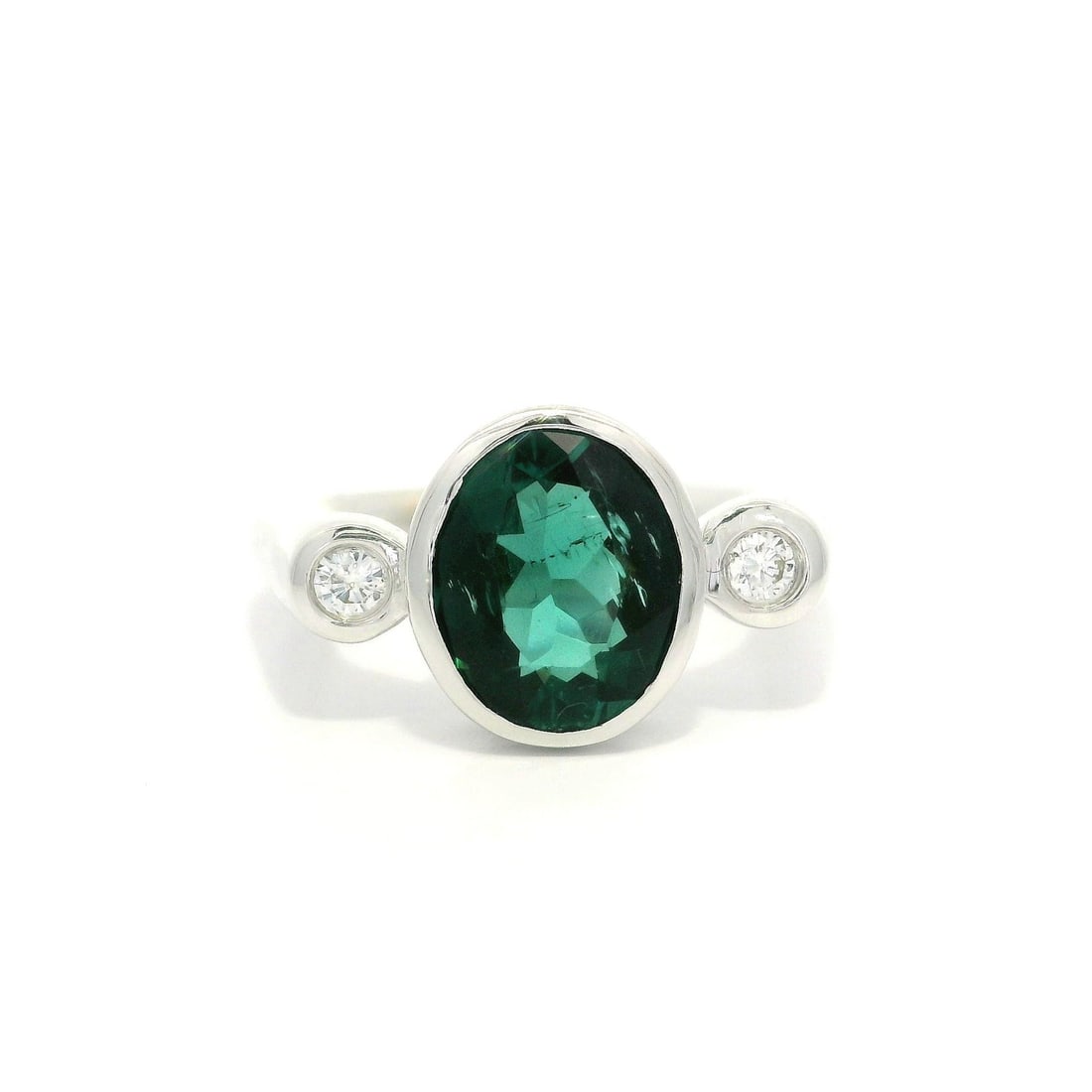 18k White Gold GIA Certified 2.14ctw Blue Green Tourmaline Diamond Ring: 18k White Gold GIA Certified 2.14ctw Blue Green Tourmaline Diamond Ring This exquisite ring features a stunning natural blue-green tourmaline, expertly cut in an oval shape and set in a secure bezel. 