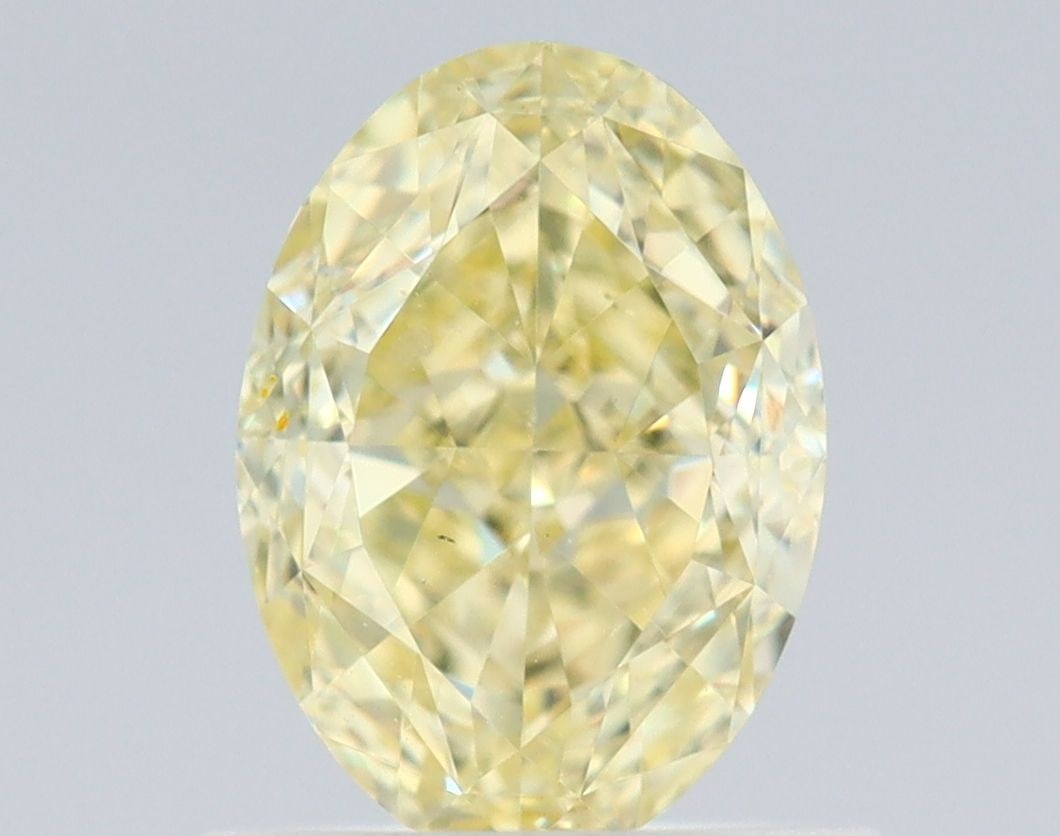 Loose Diamond - OVAL 1.01ct Fancy Yellow VS2: Loose Diamond - OVAL 1.01ct Fancy Yellow VS2 Source: Natural Shape: OVAL Carats: 1.01 Color: Fancy Yellow Certification: GIA Video: