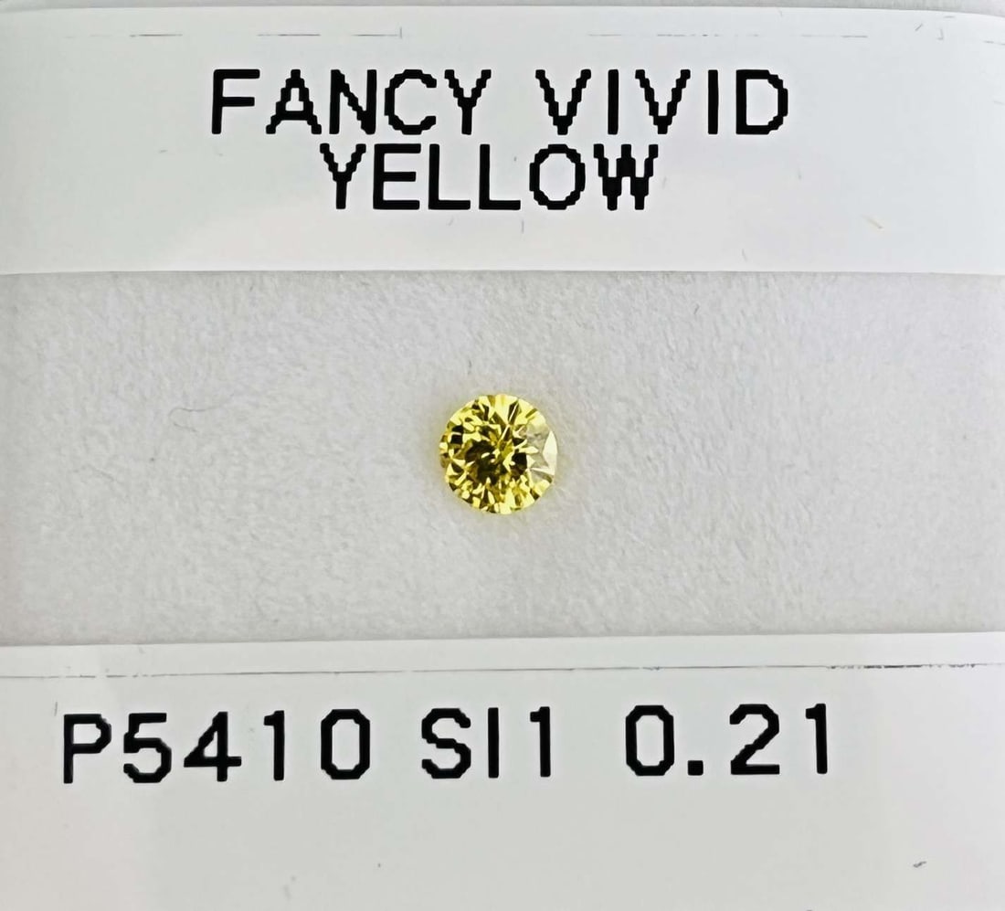 Loose Diamond - ROUND 0.21ct Fancy Vivid Yellow SI1: Loose Diamond - ROUND 0.21ct Fancy Vivid Yellow SI1 Source: Natural Shape: ROUND Carats: 0.21 Color: Fancy Vivid Yellow Certification: GIA Video: