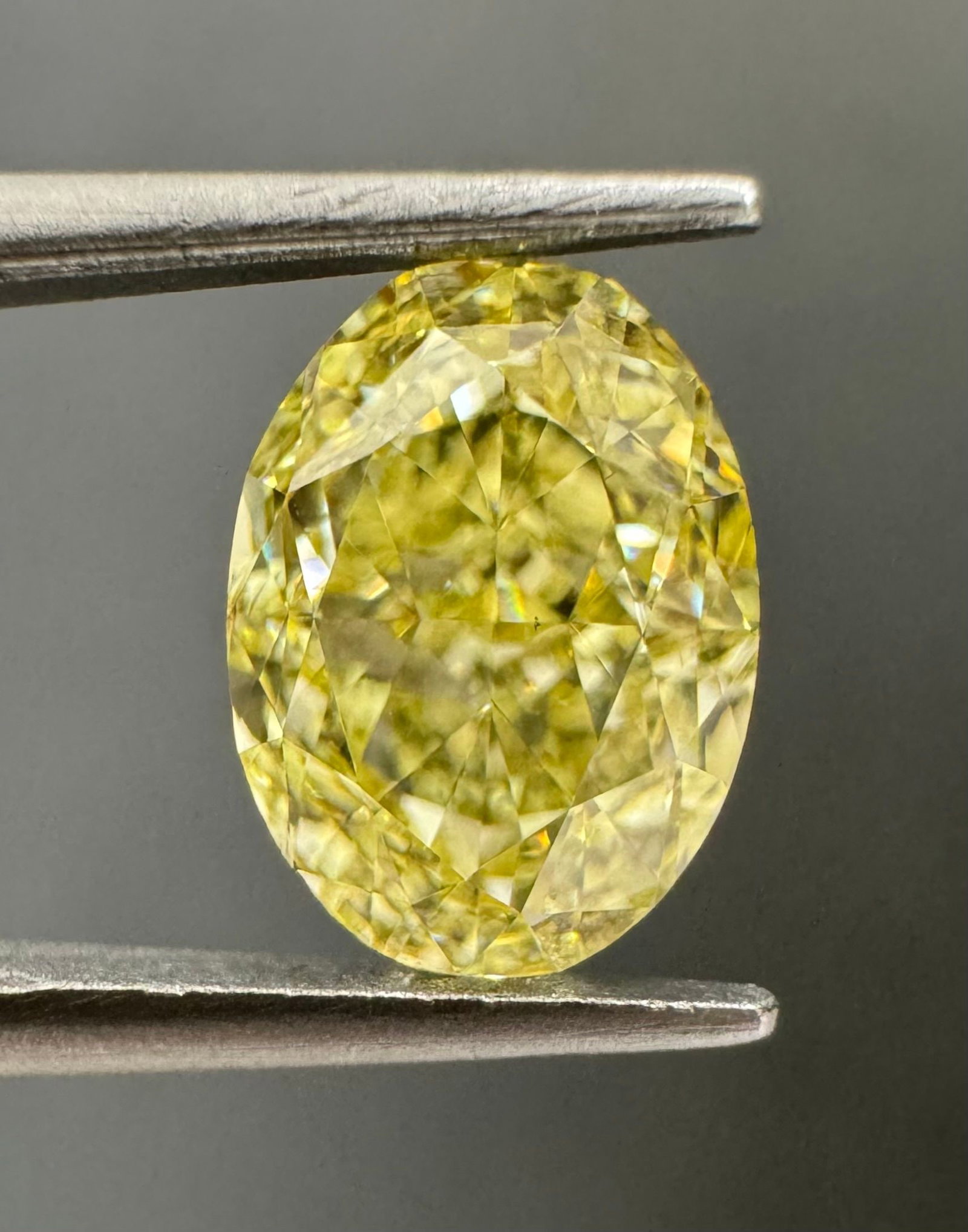 Loose Diamond - OVAL 1.19ct Fancy Yellow VS2: Loose Diamond - OVAL 1.19ct Fancy Yellow VS2 Source: Natural Shape: OVAL Carats: 1.19 Color: Fancy Yellow Certification: GIA The Diamond Depot Guarantee: All items in this auction are guaranteed to be