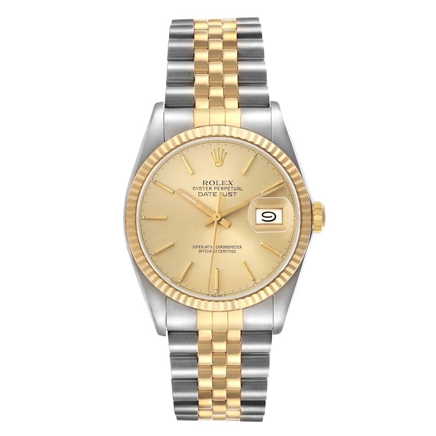 Rolex Datejust 16013 Champagne Stick Dial Jubilee Bracelet: Rolex Datejust 16013 Champagne Stick Dial Jubilee Bracelet This Rolex Datejust features a champagne stick dial and is paired with a D-Link Jubilee bracelet. The watch includes a fluted bezel and carri