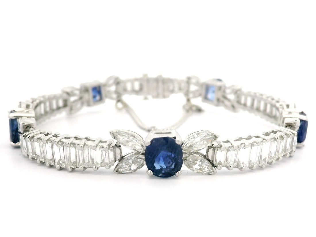 Vintage Platinum 20ctw Sapphire Baguette Marquise Diamond Bracelet: Vintage Platinum 20ctw Sapphire Baguette Marquise Diamond Bracelet This exquisite Vintage Platinum Bracelet showcases a stunning combination of sapphires and diamonds. It features a total carat weight