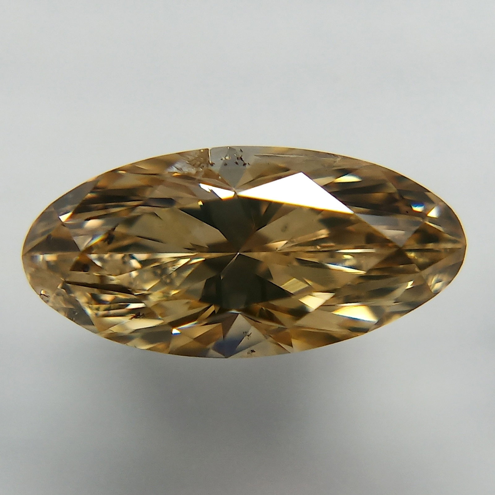 Loose Diamond - OVAL 0.7ct Fancy Yellow Brown Yellow: Loose Diamond - OVAL 0.7ct Fancy Yellow Brown Yellow Source: Natural Shape: OVAL Carats: 0.7 Color: Fancy Yellow Brown Yellow Certification: GIA The Diamond Depot Guarantee: All items in this auction 