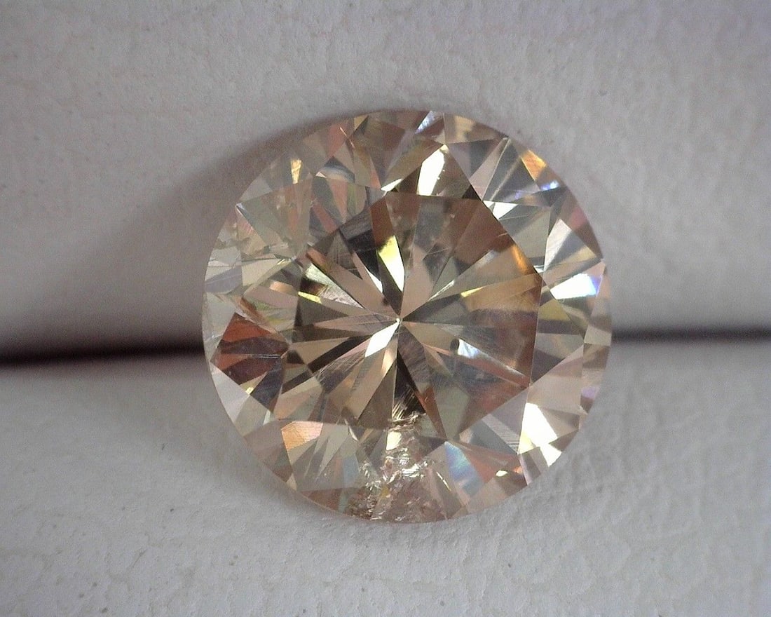 Loose Diamond - ROUND 1.08ct Brown I1: Loose Diamond - ROUND 1.08ct Brown I1 Source: Natural Shape: ROUND Carats: 1.08 Color: Brown Certification: OTHER The Diamond Depot Guarantee: All items in this auction are guaranteed to be 100% authe