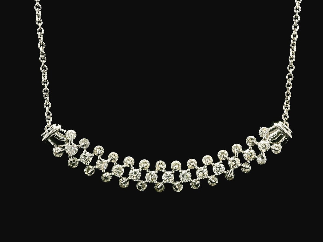 2.25ctw Diamond White Gold Pendant Necklace 17 Inch: 2.25ctw Diamond White Gold Pendant Necklace 17 Inch This exquisite White Gold Diamond Pendant Necklace features a stunning stitch look design, adorned with 41 natural round brilliant cut diamonds tota