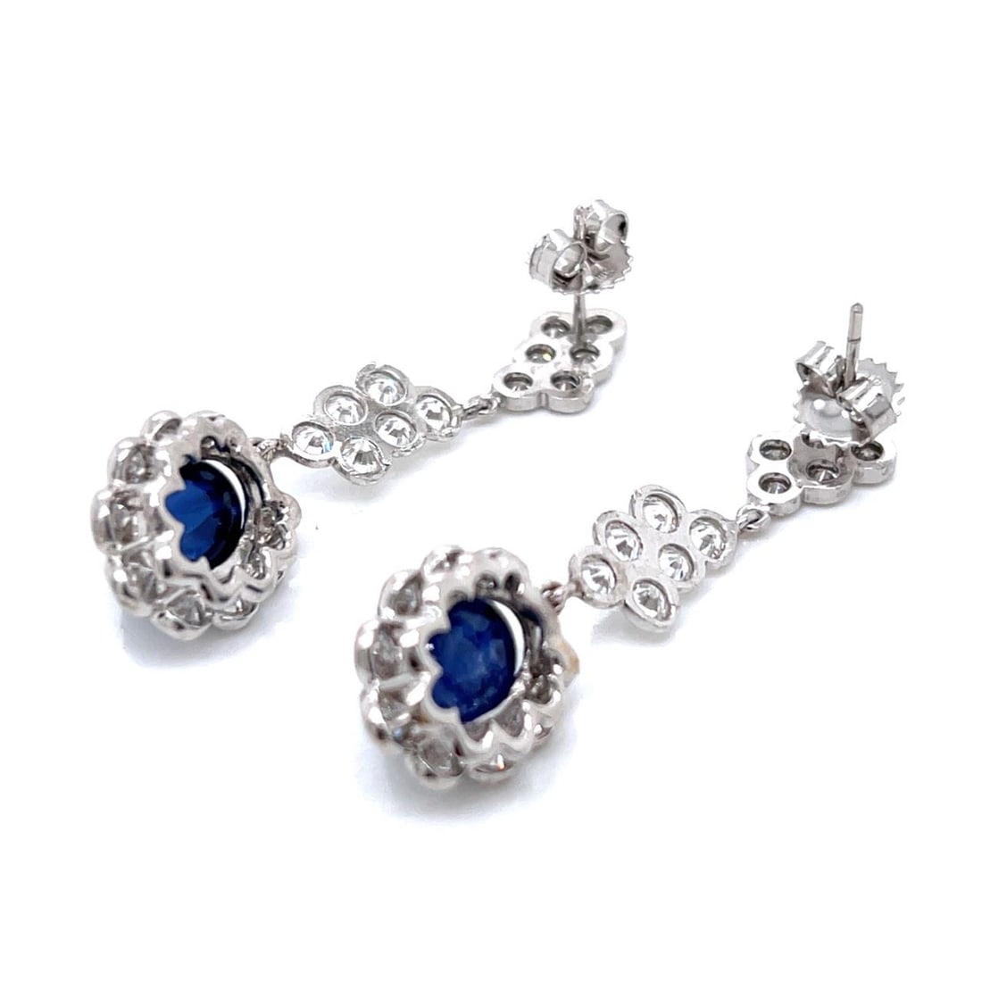 Platinum 14K White Gold Sapphire Diamond Earrings 8 Ct 3.5 Ct: Platinum 14K White Gold Sapphire Diamond Earrings 8 Ct 3.5 Ct Elegant Platinum and 14K White Gold Earrings featuring stunning Sapphire and Diamond accents. These earrings weigh 9.0 grams and are set w