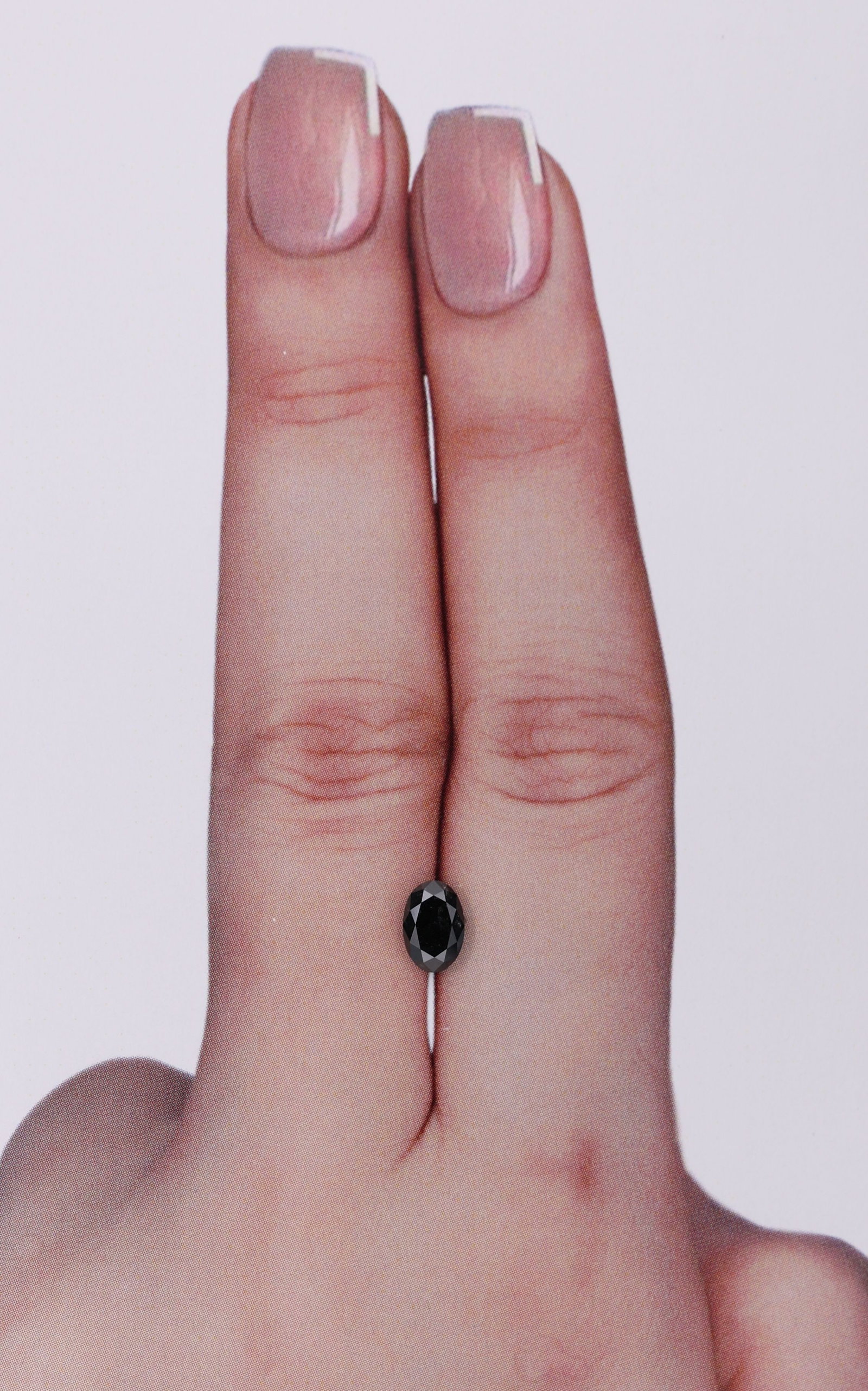 Loose Diamond - OVAL 0.56ct Fancy Black VVS2: Loose Diamond - OVAL 0.56ct Fancy Black VVS2 Source: Natural Shape: OVAL Carats: 0.56 Color: Fancy Black Certification: GIA Video: