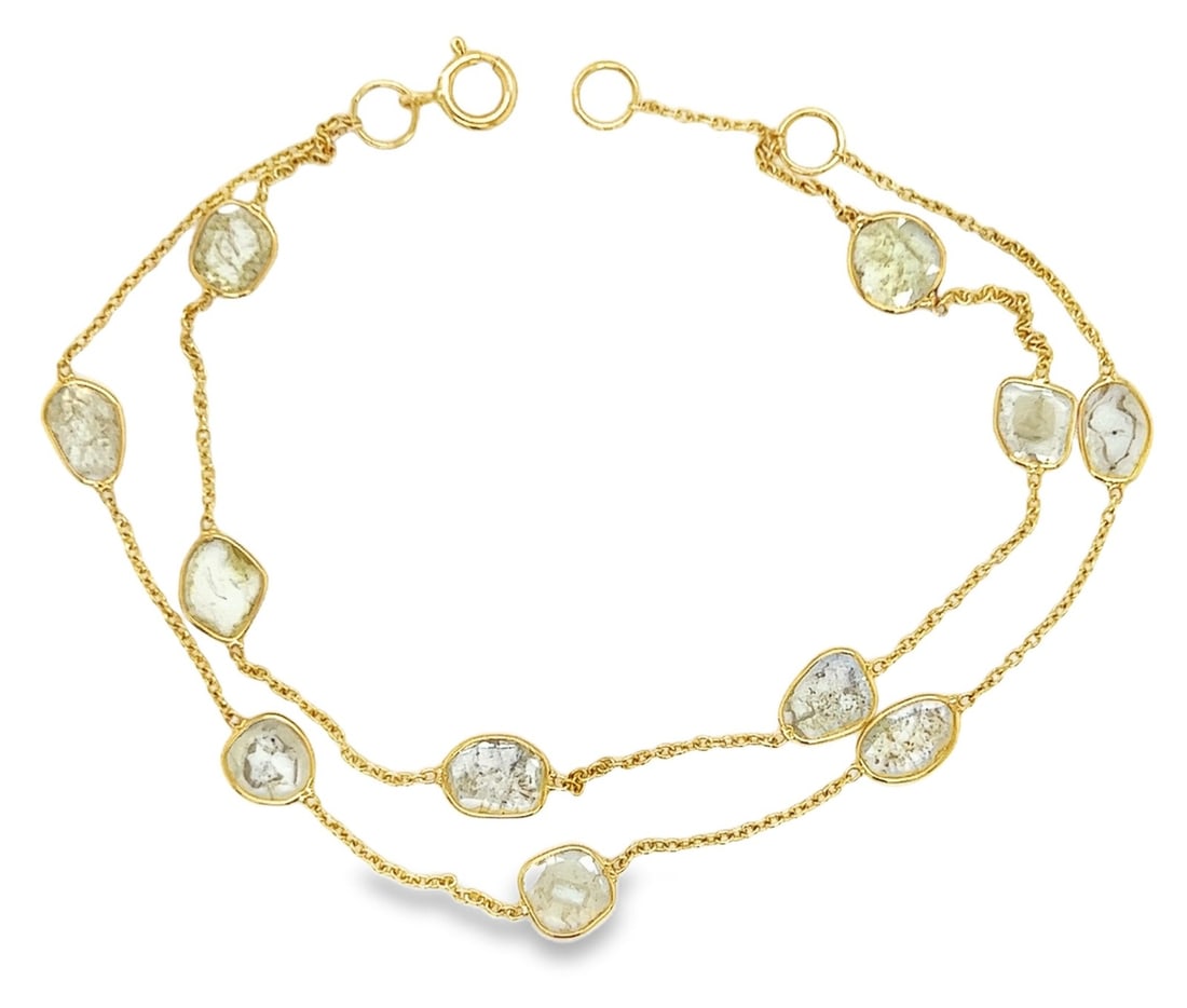 Unbranded 18k Yellow Gold Bracelet with Sliced Diamonds Double Chain: Unbranded 18k Yellow Gold Bracelet with Sliced Diamonds Double Chain This vintage estate bracelet is crafted in 18k yellow gold and features a double chain design accented with approximately 1.60 ct t