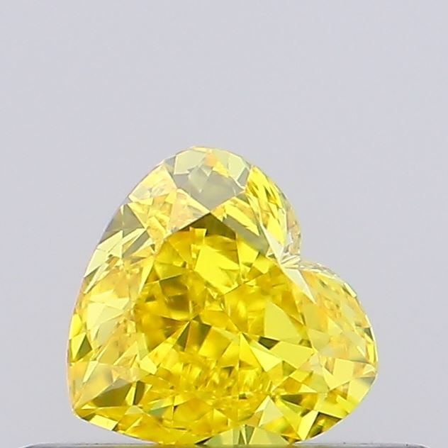 Loose Diamond - HEART 0.33ct Fancy Vivid Yellow VVS2: Loose Diamond - HEART 0.33ct Fancy Vivid Yellow VVS2 Source: This is a real non-mined Diamond that has been grown in a lab Shape: HEART Carats: 0.33 Color: Fancy Vivid Yellow Certification: NONE Video