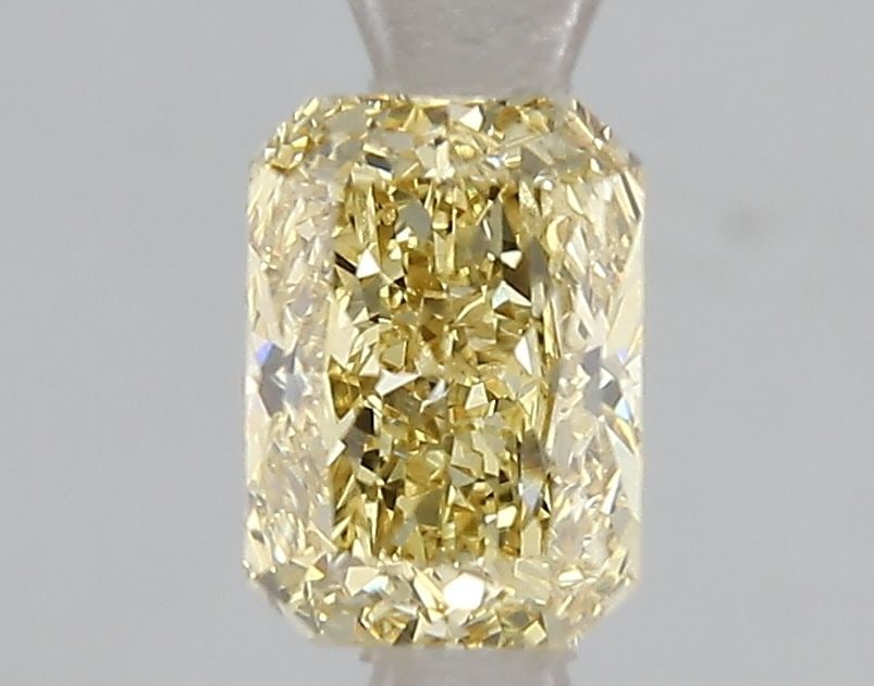 Loose Diamond - RADIANT 1.1ct Fancy Vivid Yellow SI1: Loose Diamond - RADIANT 1.1ct Fancy Vivid Yellow SI1 Source: This is a real non-mined Diamond that has been grown in a lab Shape: RADIANT Carats: 1.1 Color: Fancy Vivid Yellow Certification: IGI Video