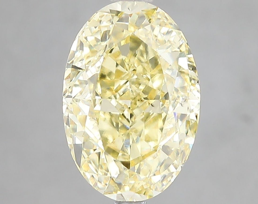 Loose Diamond - OVAL 5.03ct Fancy Intense Yellow VS2: Loose Diamond - OVAL 5.03ct Fancy Intense Yellow VS2 Source: This is a real non-mined Diamond that has been grown in a lab Shape: OVAL Carats: 5.03 Color: Fancy Intense Yellow Certification: IGI Video