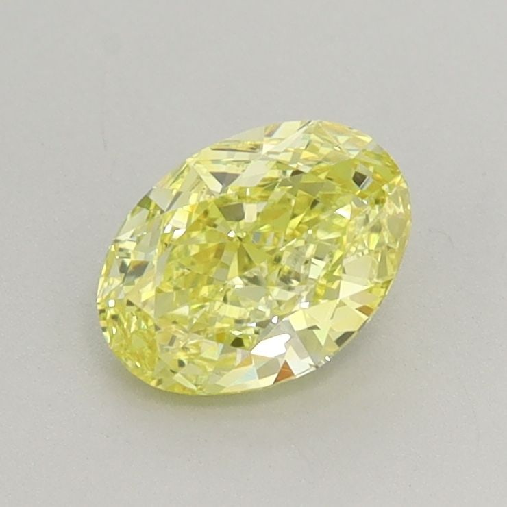 Loose Diamond - OVAL 0.86ct Fancy Vivid Yellow VS1: Loose Diamond - OVAL 0.86ct Fancy Vivid Yellow VS1 Source: This is a real non-mined Diamond that has been grown in a lab Shape: OVAL Carats: 0.86 Color: Fancy Vivid Yellow Certification: IGI Video: