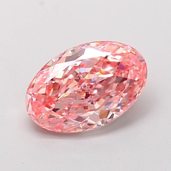 Loose Diamond - OVAL 2.28ct Fancy Vivid Pink VS2: Loose Diamond - OVAL 2.28ct Fancy Vivid Pink VS2 Source: This is a real non-mined Diamond that has been grown in a lab Shape: OVAL Carats: 2.28 Color: Fancy Vivid Pink Certification: IGI Video: