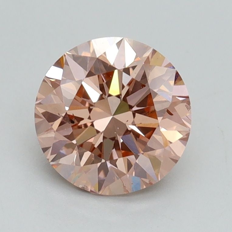 Loose Diamond - ROUND 1.3ct Fancy Intense Pink SI1: Loose Diamond - ROUND 1.3ct Fancy Intense Pink SI1 Source: This is a real non-mined Diamond that has been grown in a lab Shape: ROUND Carats: 1.3 Color: Fancy Intense Pink Certification: IGI Video: