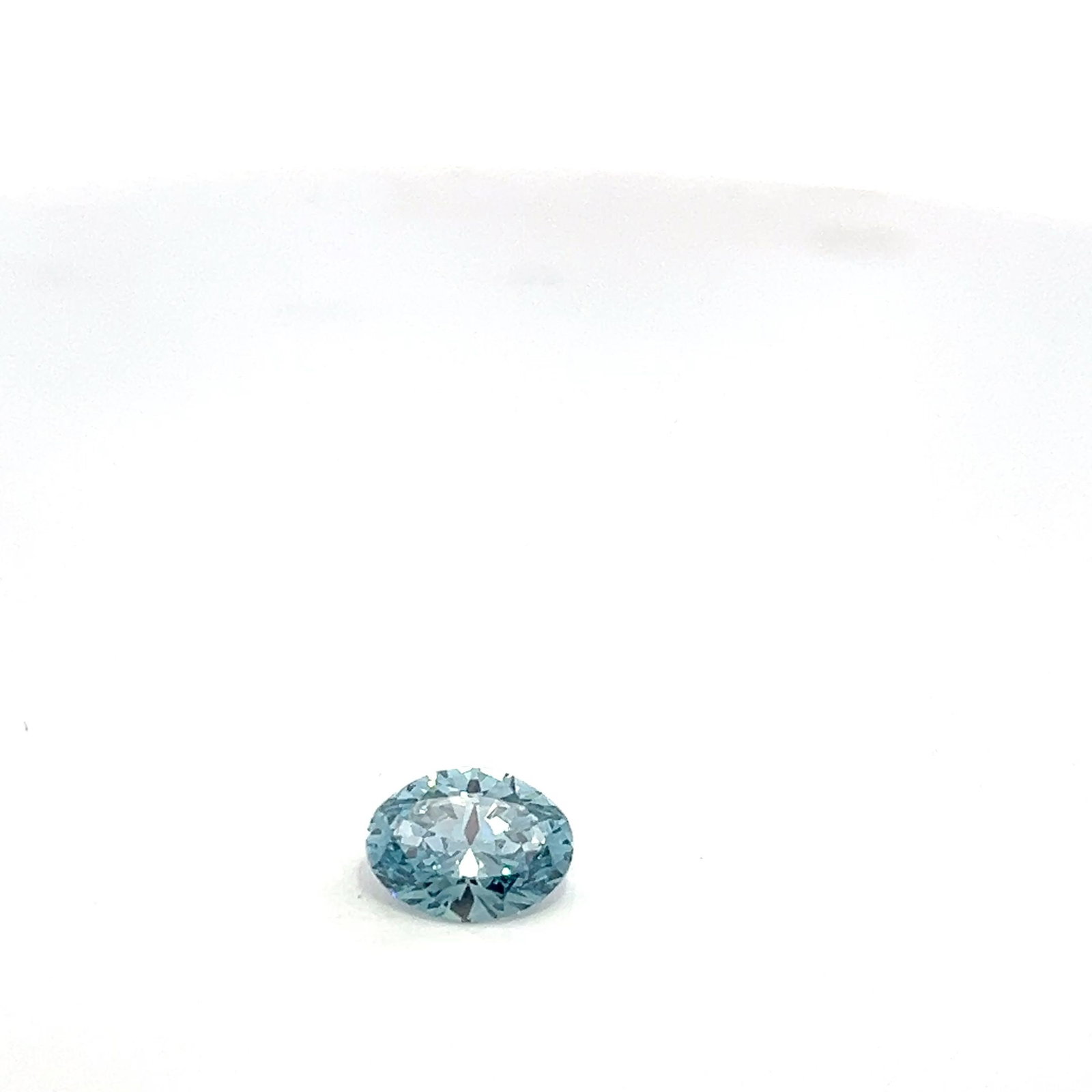 Loose Diamond - OVAL 2.1ct Fancy Blue VS1: Loose Diamond - OVAL 2.1ct Fancy Blue VS1 Source: This is a real non-mined Diamond that has been grown in a lab Shape: OVAL Carats: 2.1 Color: Fancy Blue Certification: NONE The Diamond Depot Guarante