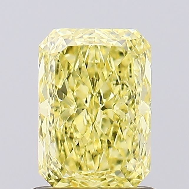 Loose Diamond - RADIANT 1.08ct Fancy Vivid Yellow VS2: Loose Diamond - RADIANT 1.08ct Fancy Vivid Yellow VS2 Source: This is a real non-mined Diamond that has been grown in a lab Shape: RADIANT Carats: 1.08 Color: Fancy Vivid Yellow Certification: IGI Vid