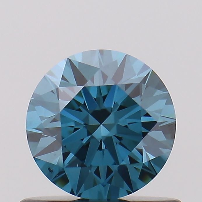 Loose Diamond - ROUND 0.6ct Fancy Vivid Blue SI1: Loose Diamond - ROUND 0.6ct Fancy Vivid Blue SI1 Source: This is a real non-mined Diamond that has been grown in a lab Shape: ROUND Carats: 0.6 Color: Fancy Vivid Blue Certification: NONE Video: