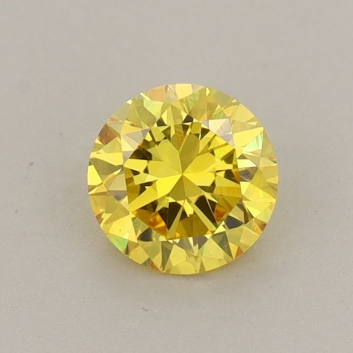 Loose Diamond - ROUND 0.55ct Fancy Vivid Yellow VS1: Loose Diamond - ROUND 0.55ct Fancy Vivid Yellow VS1 Source: This is a real non-mined Diamond that has been grown in a lab Shape: ROUND Carats: 0.55 Color: Fancy Vivid Yellow Certification: IGI Video: