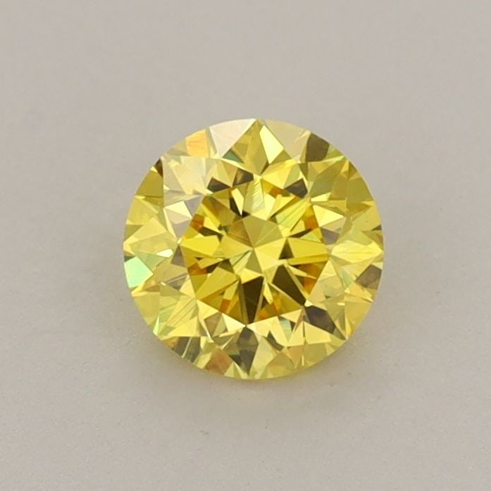 Loose Diamond - ROUND 0.55ct Fancy Vivid Yellow VS1: Loose Diamond - ROUND 0.55ct Fancy Vivid Yellow VS1 Source: This is a real non-mined Diamond that has been grown in a lab Shape: ROUND Carats: 0.55 Color: Fancy Vivid Yellow Certification: IGI Video: