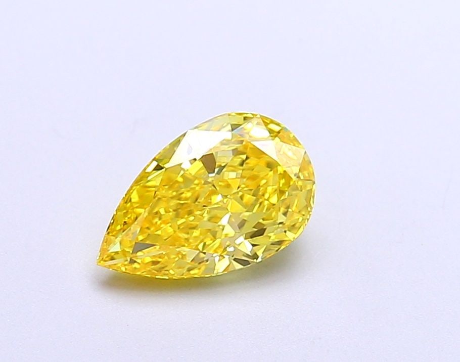 Loose Diamond - PEAR 1.0ct Fancy Vivid Yellow VS1: Loose Diamond - PEAR 1.0ct Fancy Vivid Yellow VS1 Source: This is a real non-mined Diamond that has been grown in a lab Shape: PEAR Carats: 1.0 Color: Fancy Vivid Yellow Certification: IGI Video: