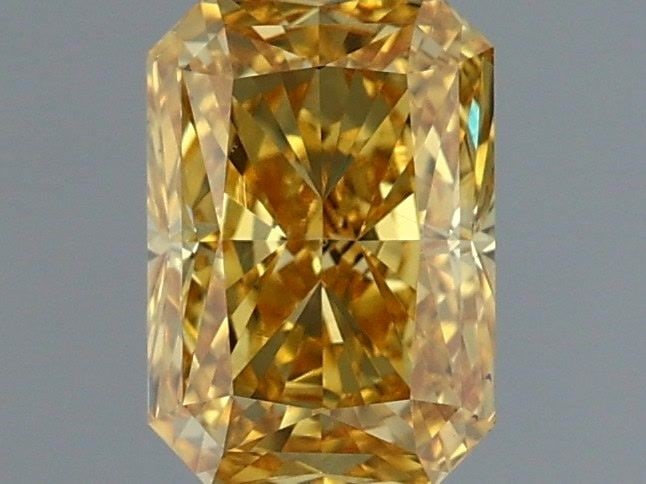 Loose Diamond - RADIANT 1.0ct Fancy Vivid Yellow VS1: Loose Diamond - RADIANT 1.0ct Fancy Vivid Yellow VS1 Source: This is a real non-mined Diamond that has been grown in a lab Shape: RADIANT Carats: 1.0 Color: Fancy Vivid Yellow Certification: IGI Video