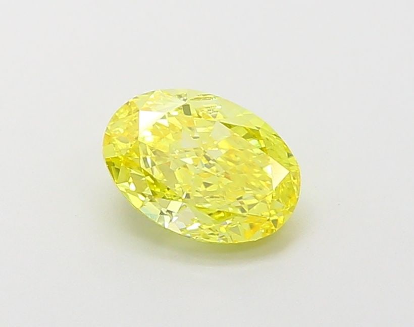 Loose Diamond - OVAL 1.19ct Fancy Vivid Yellow VS1: Loose Diamond - OVAL 1.19ct Fancy Vivid Yellow VS1 Source: This is a real non-mined Diamond that has been grown in a lab Shape: OVAL Carats: 1.19 Color: Fancy Vivid Yellow Certification: IGI Video: