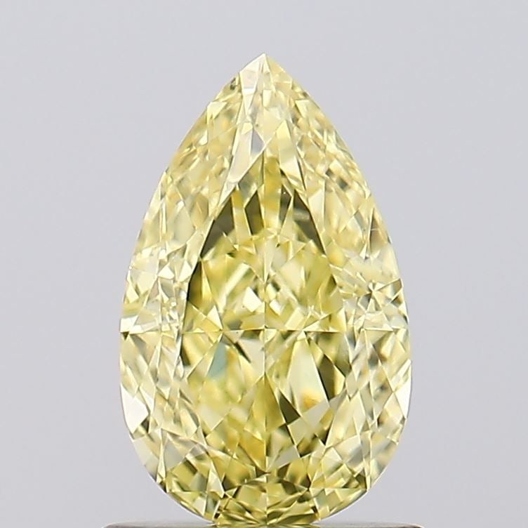 Loose Diamond - PEAR 1.06ct Fancy Vivid Yellow VS1: Loose Diamond - PEAR 1.06ct Fancy Vivid Yellow VS1 Source: This is a real non-mined Diamond that has been grown in a lab Shape: PEAR Carats: 1.06 Color: Fancy Vivid Yellow Certification: IGI Video: