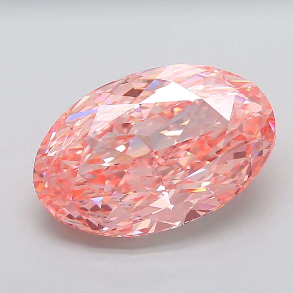 Loose Diamond - OVAL 13.78ct Fancy Vivid Pink VS1: Loose Diamond - OVAL 13.78ct Fancy Vivid Pink VS1 Source: This is a real non-mined Diamond that has been grown in a lab Shape: OVAL Carats: 13.78 Color: Fancy Vivid Pink Certification: IGI Video: